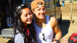 Drew takes time from the track to take pictures with Emblem 3 fans!